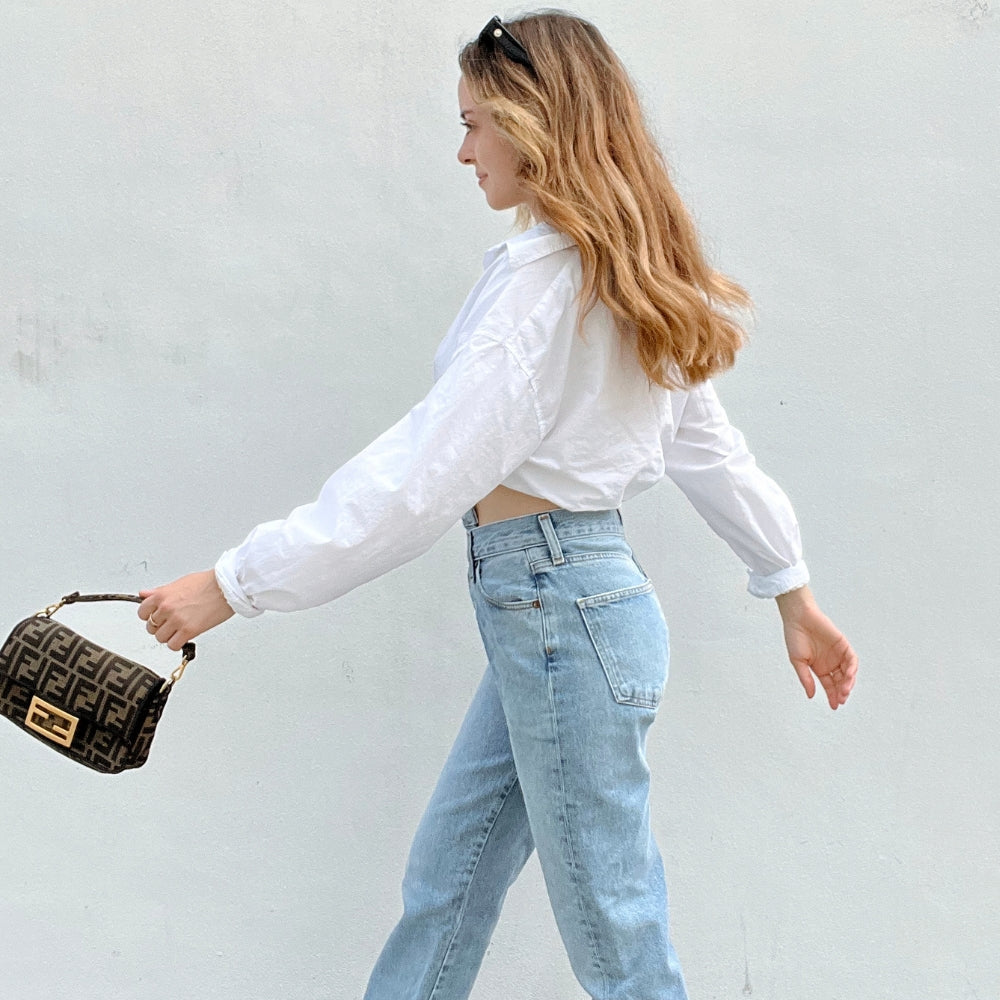 woman walking in denim